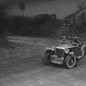 MG TA of HV Slade competing in the MG Car Club Midland Centre Trial, 1938. Artist: Bill Brunell