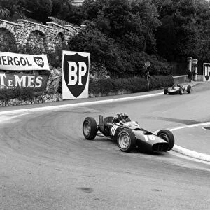 1962_17: Graham Hill leads Jim Clark into the Old Station Hairpin. Hill finished in 6th position