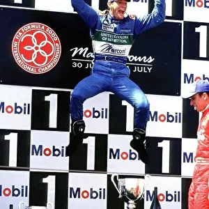 2001 F3000 Championship. Magny-Cours, France. 30th June 2001. Mark Webber (Super Nova) proves that not only Michael Schumacher can leap in the air, as he celebrates his race win