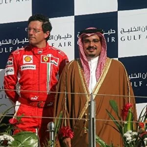 Formula One World Championship: Luca Baldeseri, Ferrari on the podium with His Highness the Crown Prince Shaikh Salman bin Isa Hamad Al Khalifa