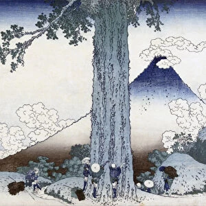 Mishima mountain pass in Kai province, Japan, showing Mt Fuji. After a woodblock print dating from circa 1830 by Japanese artist Katsushika Hokusai, 1760 - 1849. The woodblock is part of a series known as Thirty-six Views of Mount Fuji