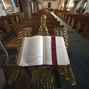 An Open Bible On A Gold Podium In St. Andrews Church; Kelso, Scottish Borders, Scotland