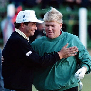John Daly is congratulated by Constantino Rocca after his victory in the play offs for