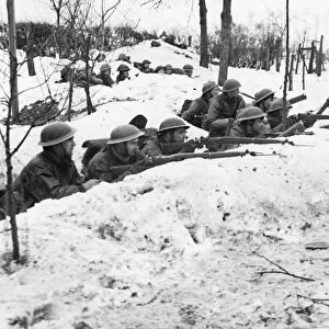 Men of 2nd Platoon B Company firing from trenches near Stein, Germany