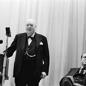Winston Churchill speaking to a packed hall at Woodford