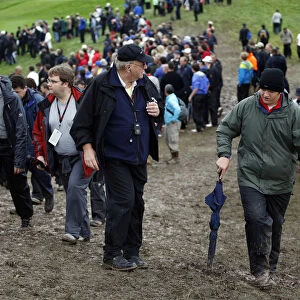 Spectators In The Mud