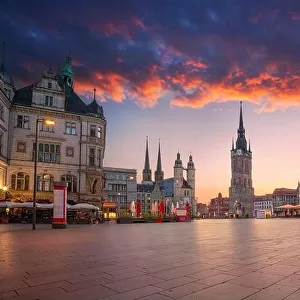 Halle, Germany. Cityscape image of historical downtown of Halle (Saale) with the Red Tower and the Market Place during dramatic sunset